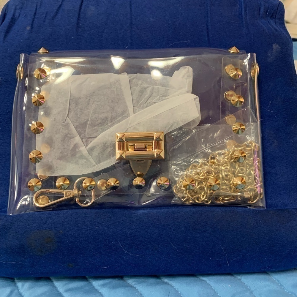Cute, clear bag can be used as a wristlet or Crossbody